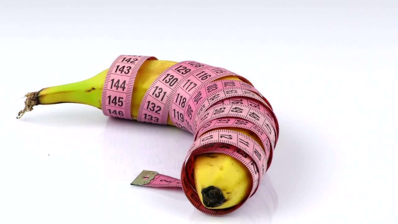 Free Stock Video Rolled Banana With Measuring Tape Live Wallpaper - Free Download
