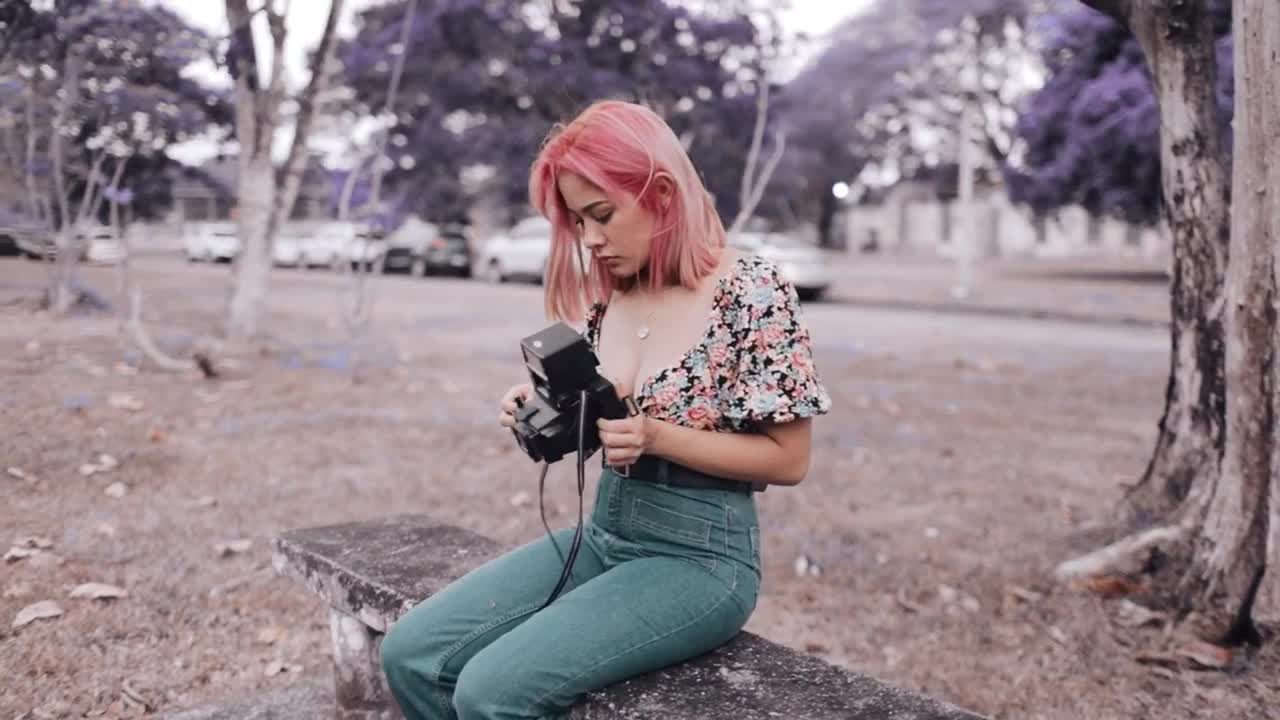 Stock Footage Urban Trendy Woman Holding An Old Photo Camera Live Wallpaper - Free Download