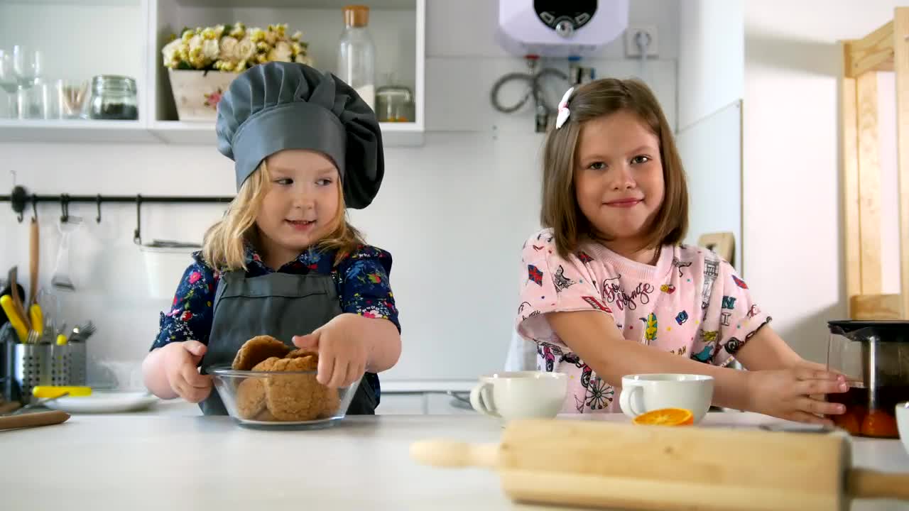 Free Stock Video Two Girls After Successfully Baking Cookies Live Wallpaper - Free Download
