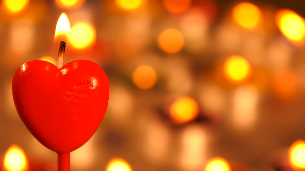 Video Stock Red Heart Shaped Candle With More Candles Behind Live Wallpaper Free - Free Download