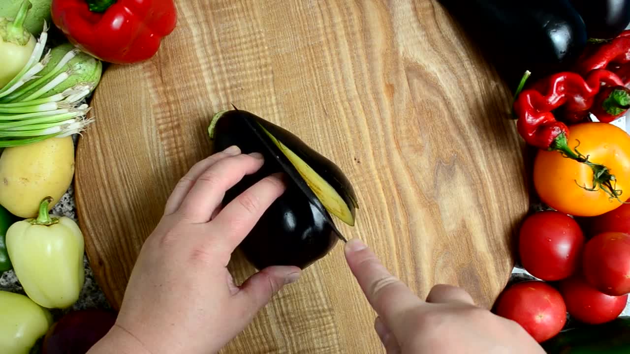 Free Video Stock top view of a person slicing vegetables Live Wallpaper - Free Download