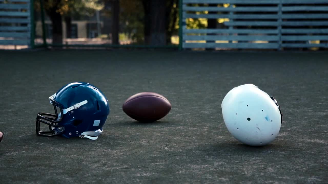 Stock Video Football Players Taking Helmets From The Ground Live Wallpaper For PC - Free Download