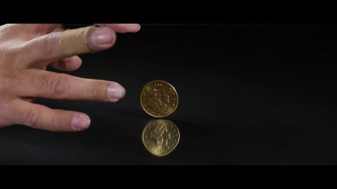 Free Video Stock Spinning Coin On A Reflective Surface Live Wallpaper - Free Download