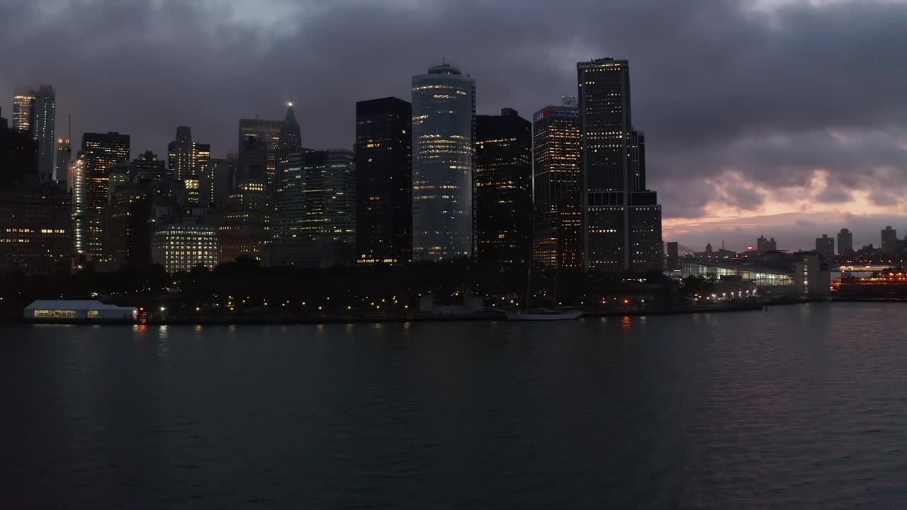 Stock Video Manhattan Skyline View Over The Water At Nigh Animated Wallpaper - Free Download