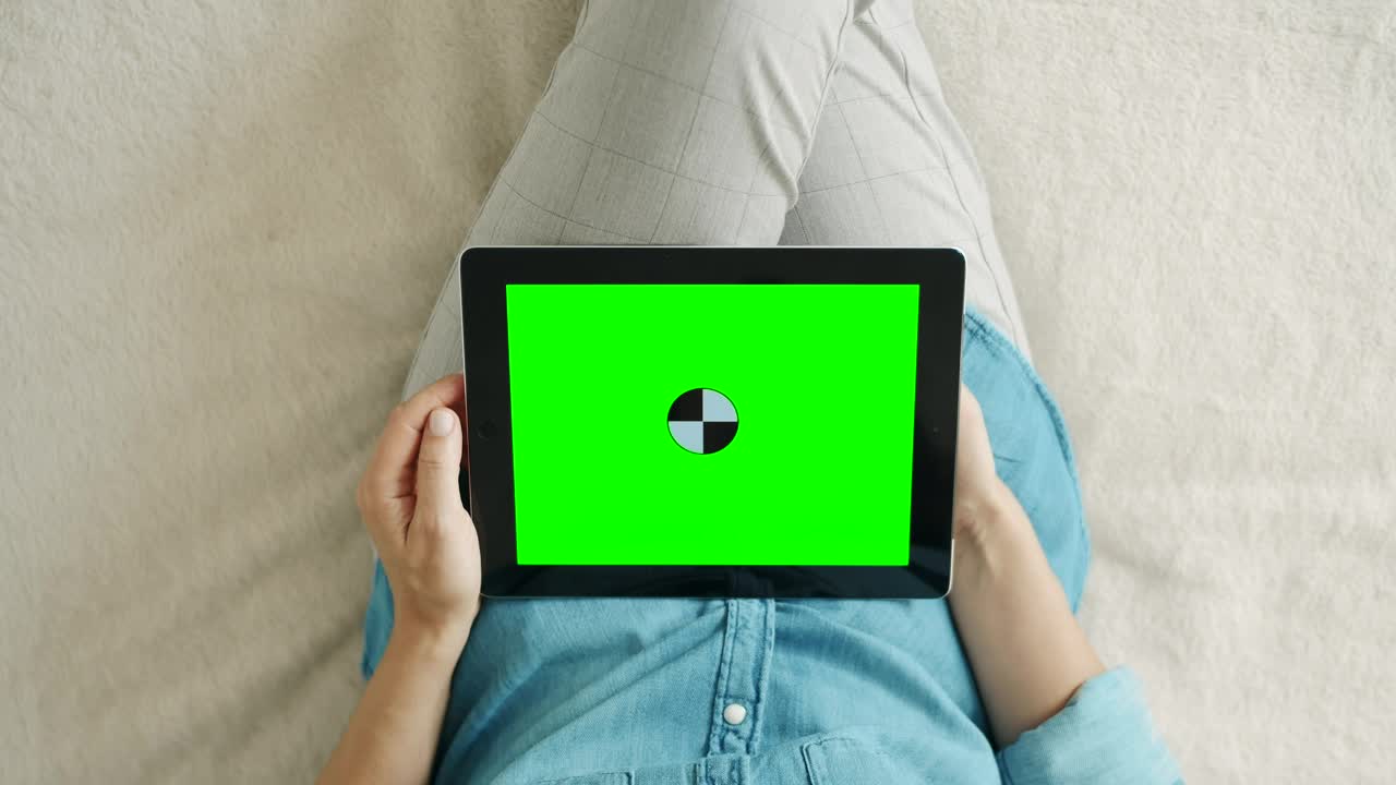 Free Video Stock top shot of a person using a tablet with chroma Live Wallpaper - Free Download