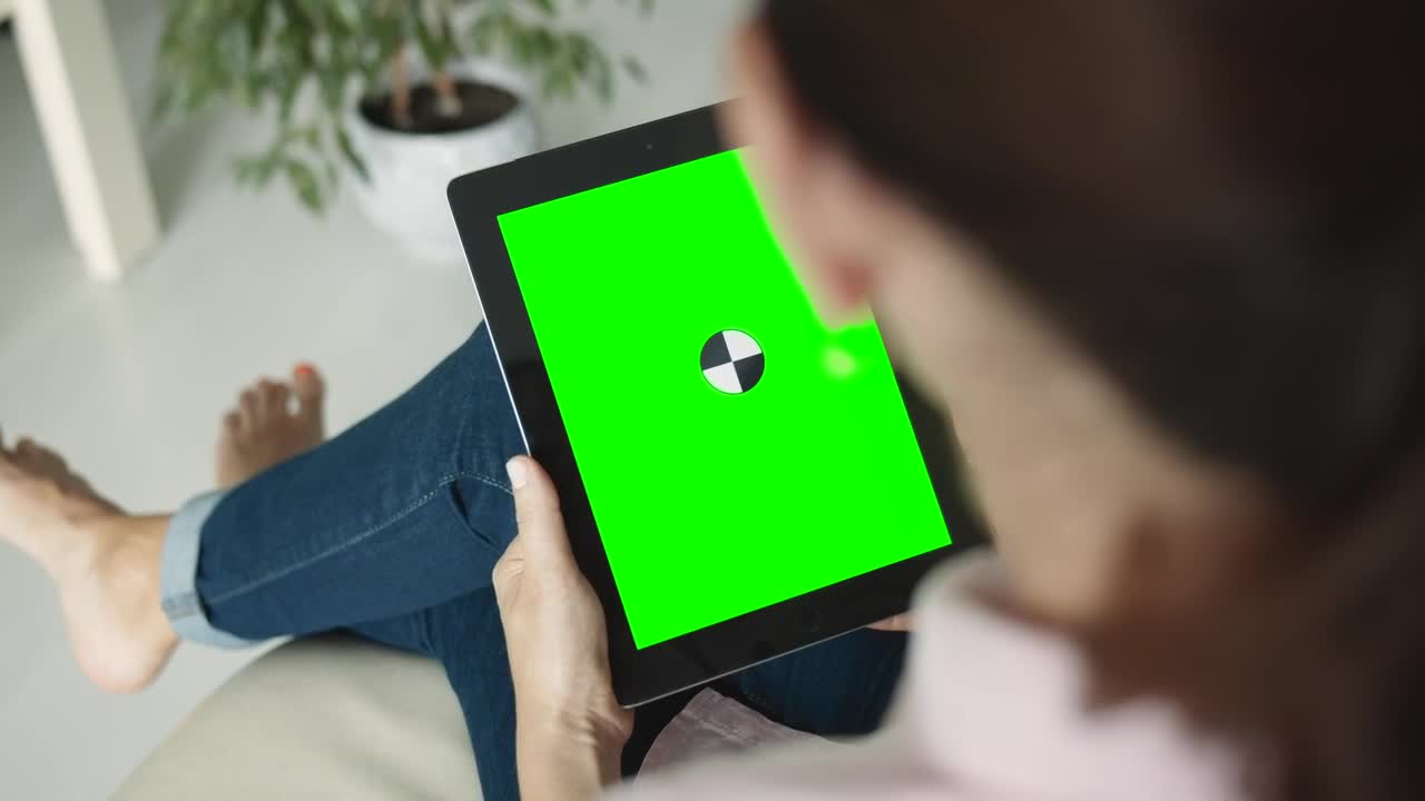 Stock Footage Woman Admires Website On Chromakey Tablet Live Wallpaper - Free Download