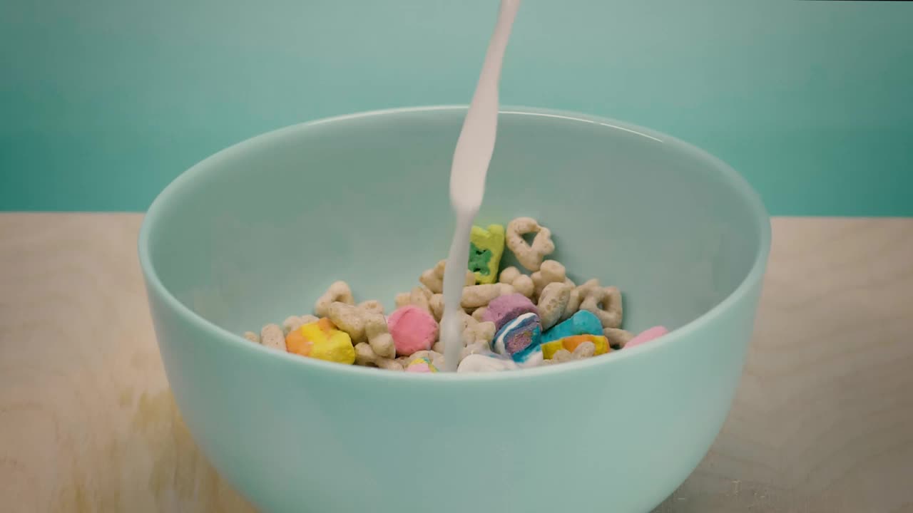 Stock Video Healthy Cereal In A Bowl While Pouring Milk Animated Wallpaper - Free Download