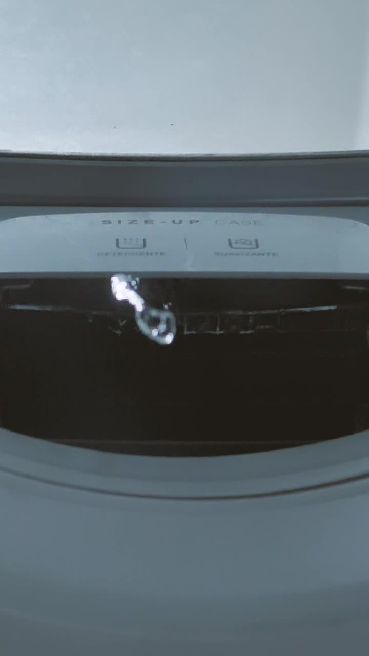 Stock Video Inside Of A Washing Machine While Filling With Water Animated Wallpaper - Free Download