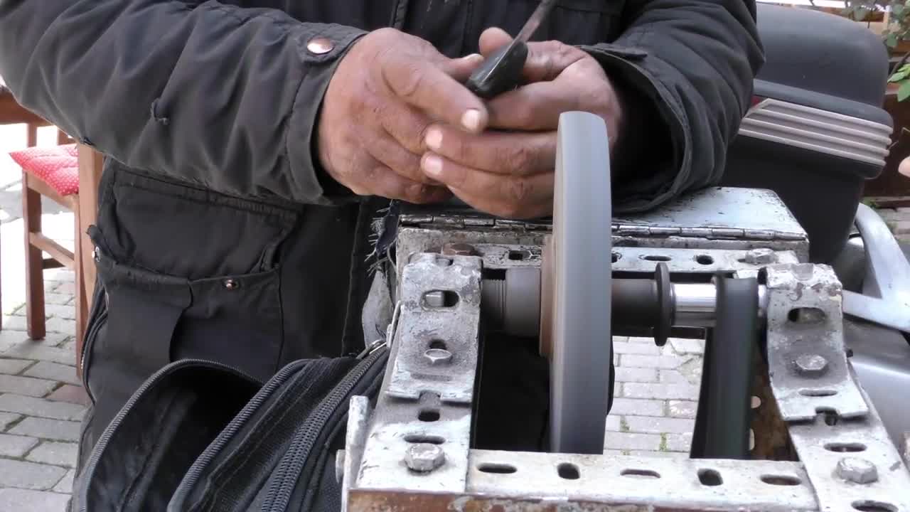 Free Stock Video Worker Sharpening His Tool On A Machine Live Wallpaper - Free Download