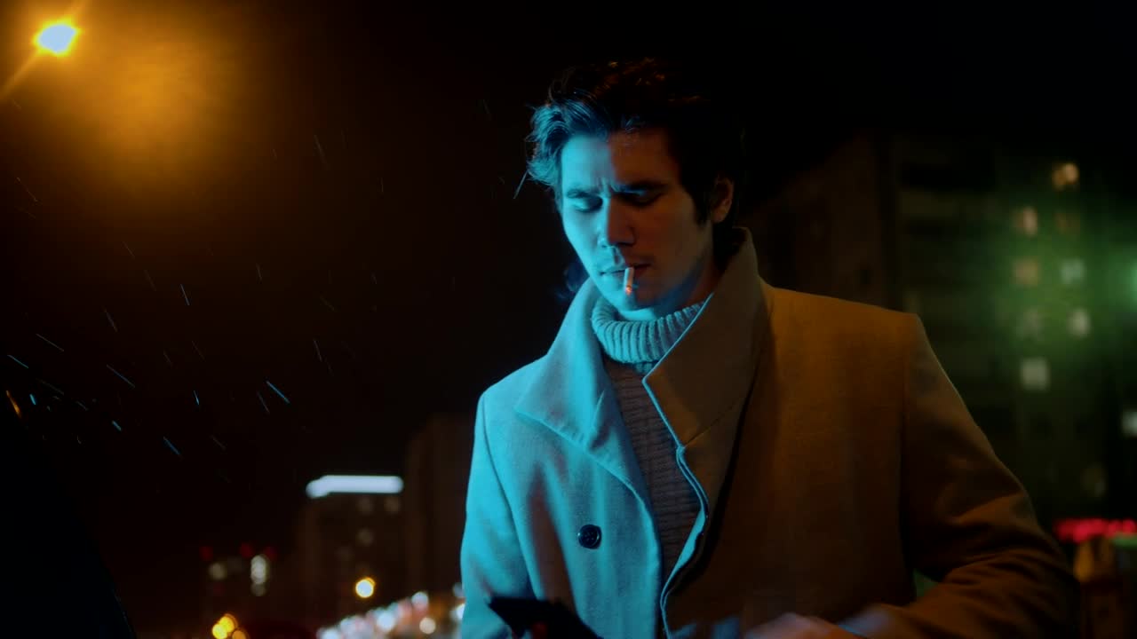 Free Video Stock Stylish Man Smoking A Cigarette And Texting A Message Live Wallpaper - Free Download
