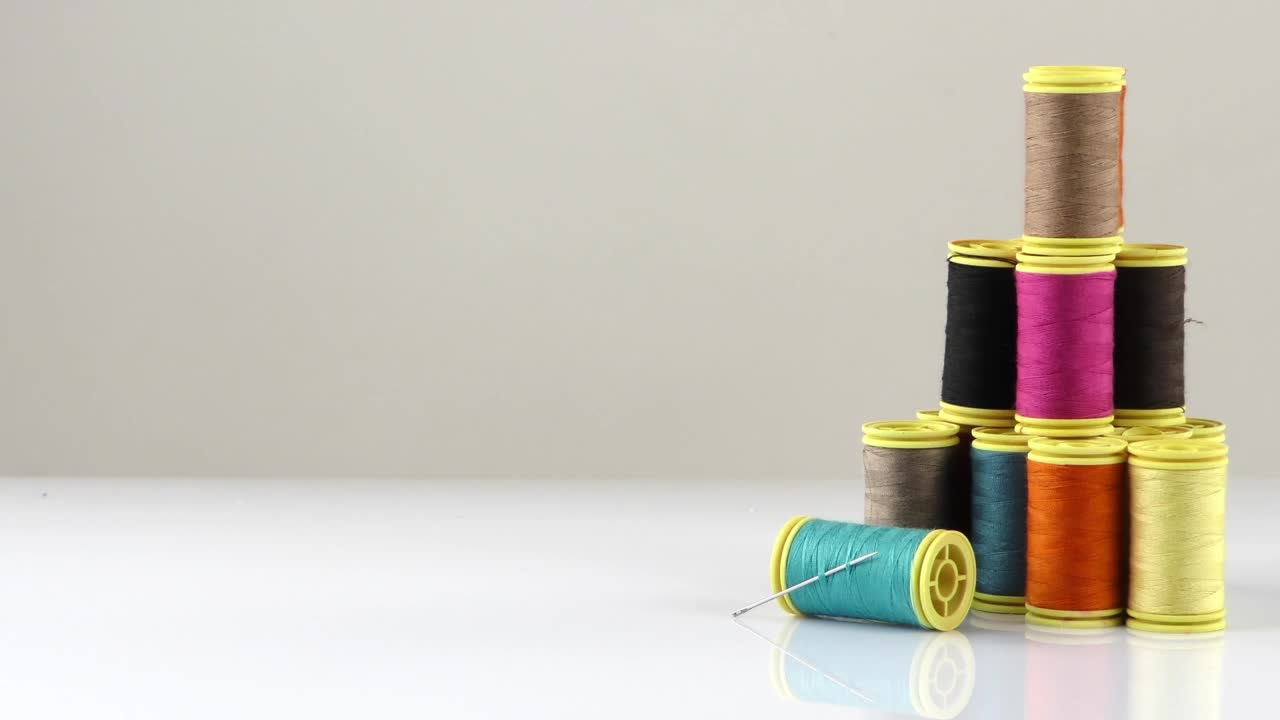 Free Stock Video Sewing Threads On White Background Live Wallpaper - Free Download