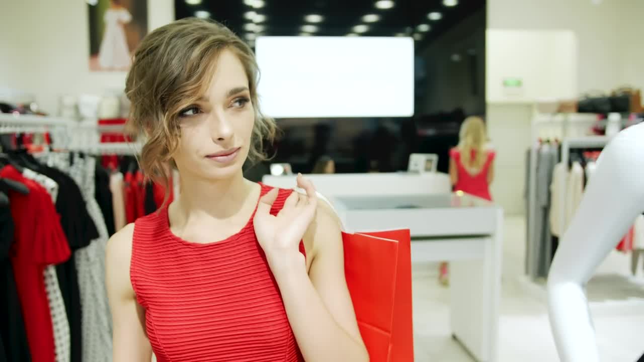 Stock Video Confident Woman Walks Through A Clothing Store Live Wallpaper For PC - Free Download
