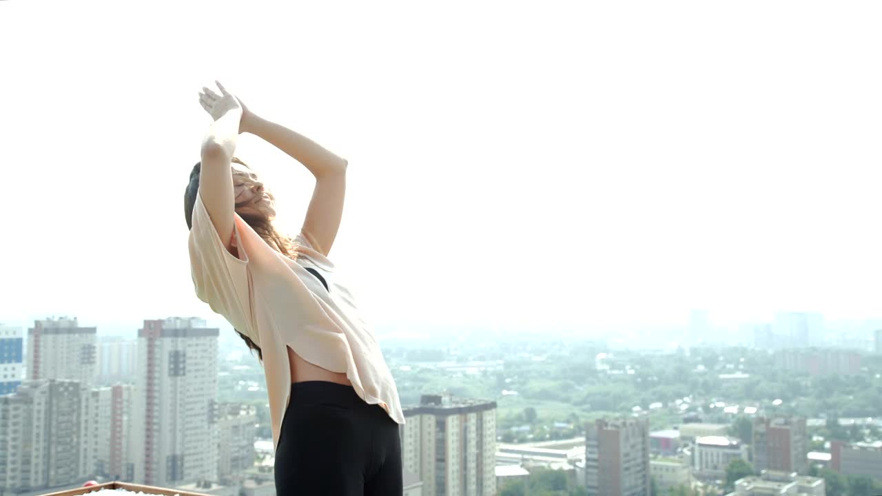 Free Stock Video Young Woman Practicing Yoga Poses On A Rooftop Live Wallpaper - Free Download