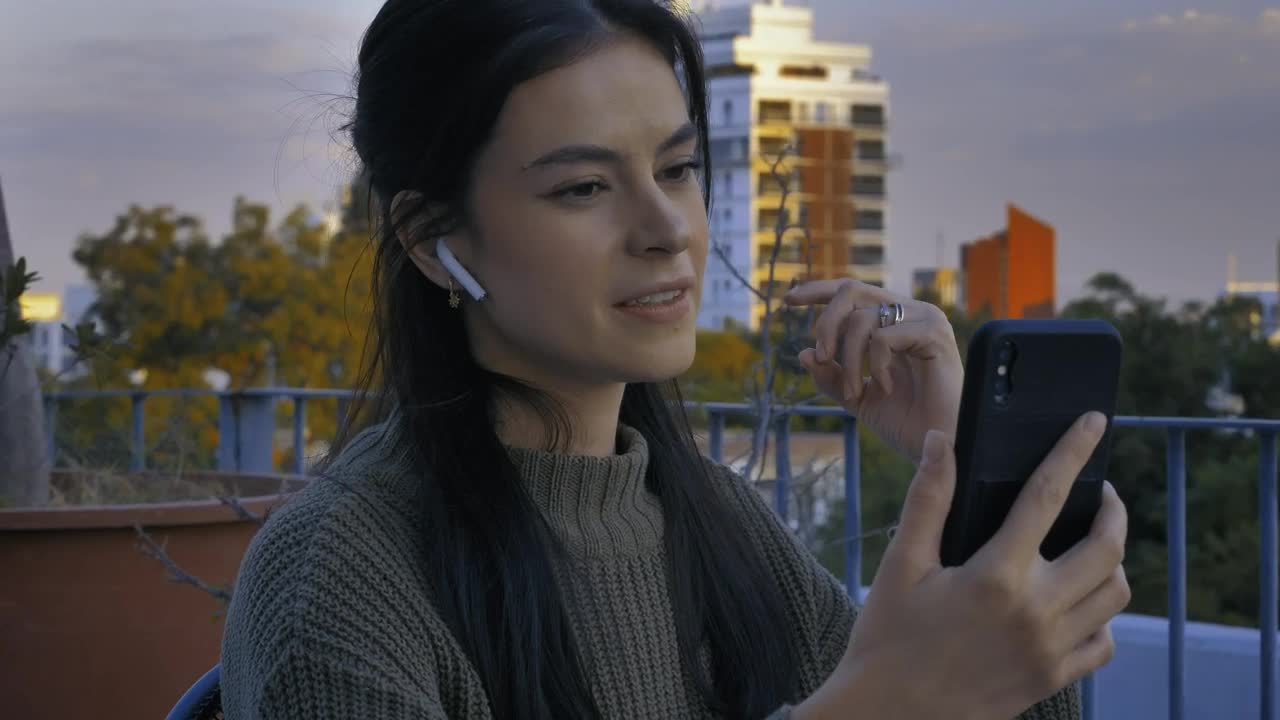 Free Stock Video Young Woman On A Terrace Having A Video Call Live Wallpaper - Free Download
