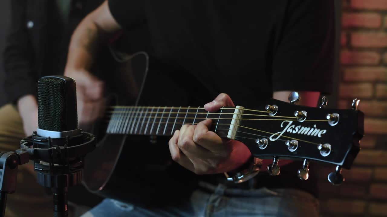 Stock Video Guitarist Performing With An Accoustic Guitar Live Wallpaper For PC - Free Download