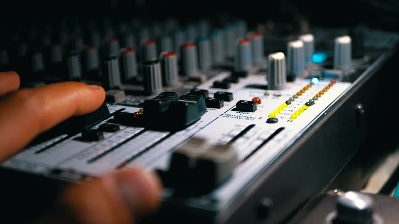 Stock Video Mans Hand Working On A Sound Mixing Consol Animated Wallpaper - Free Download