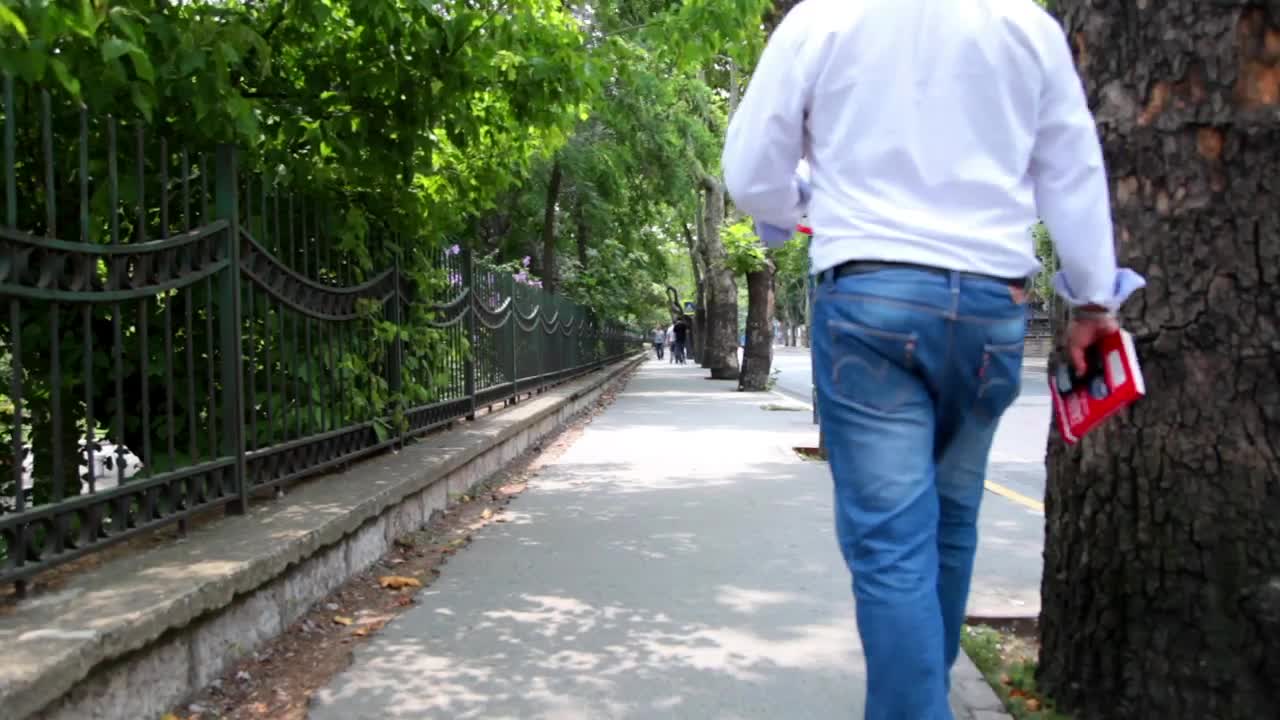 Free Stock Video Sidewalk In A City With A Couple Of People Walking Live Wallpaper - Free Download