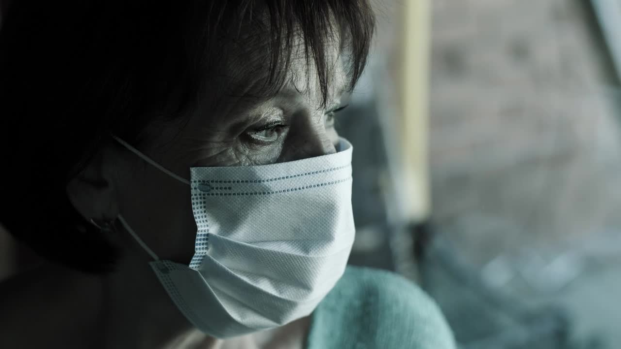 Stock Video Old Woman With Sad Look Wearing Mask Live Wallpaper - Free Download