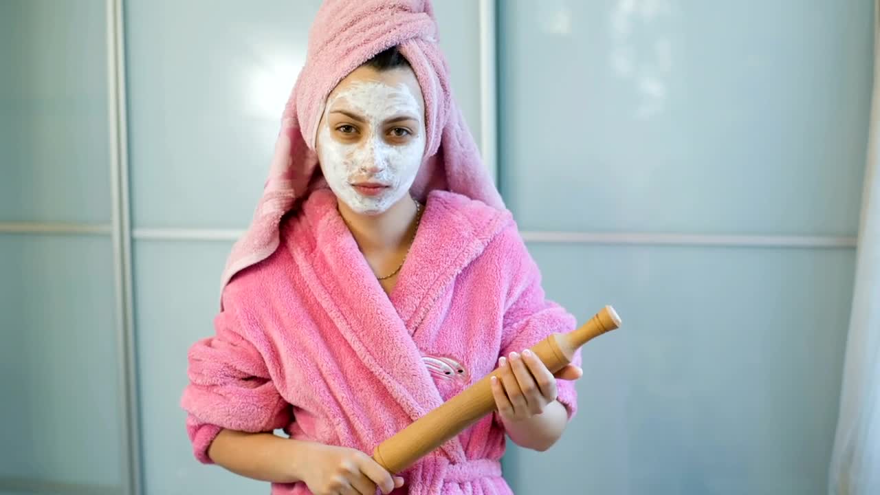 Stock Video Housewife With A Face Mask Upset With A Roller Animated Wallpaper - Free Download