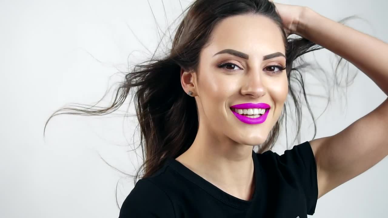 Free Video Stock Smiling Model In Purple Lipstick On White Background Live Wallpaper - Free Download