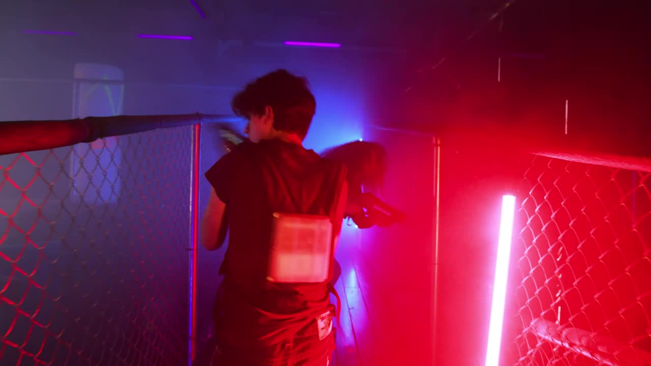 Stock Video Pair Of Friends Cleverly Playing Laser Tag Live Wallpaper - Free Download