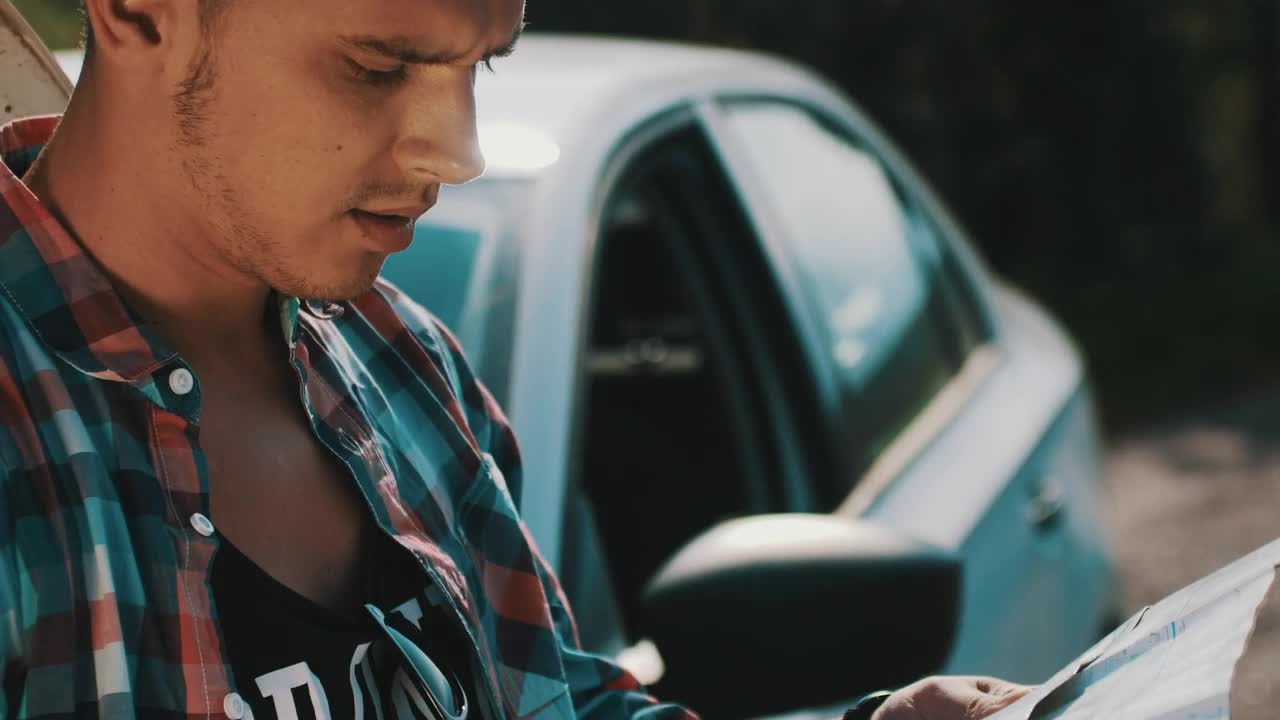 Stock Video Man Looking At A Map By His Broken Ca Animated Wallpaper - Free Download