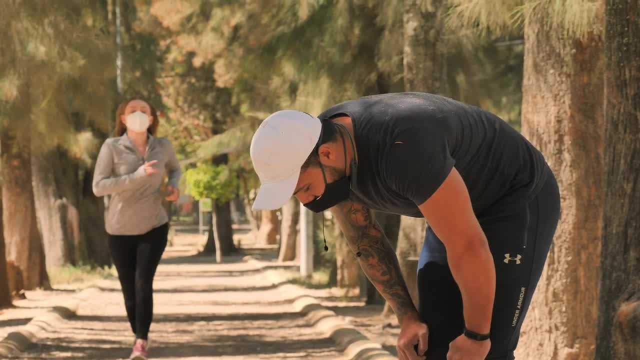 Stock Video Couple Gives A Hi Five After Running Live Wallpaper For PC - Free Download