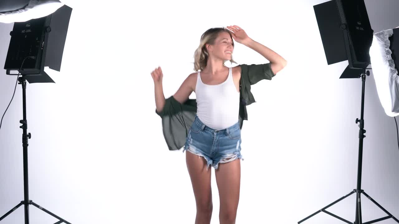 Stock Video Girl Dancing On A White Background On A Set Live Wallpaper For PC - Free Download