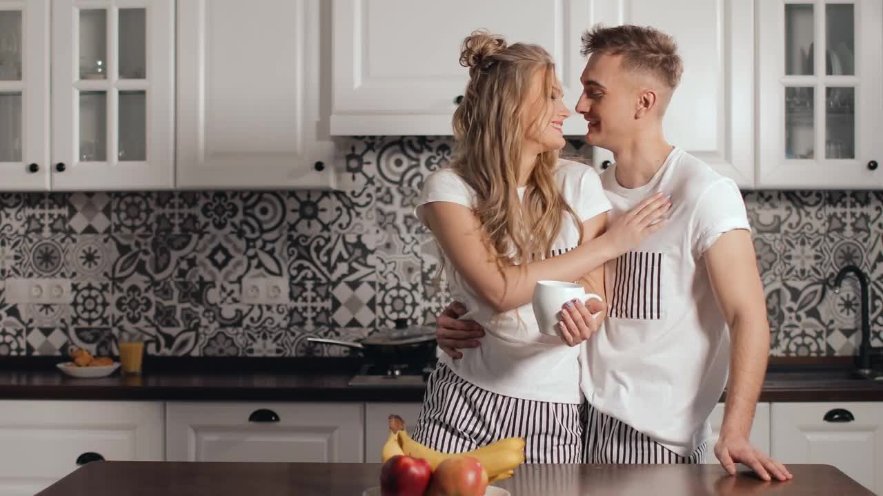 Stock Video Couple Share Romantic Moment In Kitchen Live Wallpaper For PC - Free Download