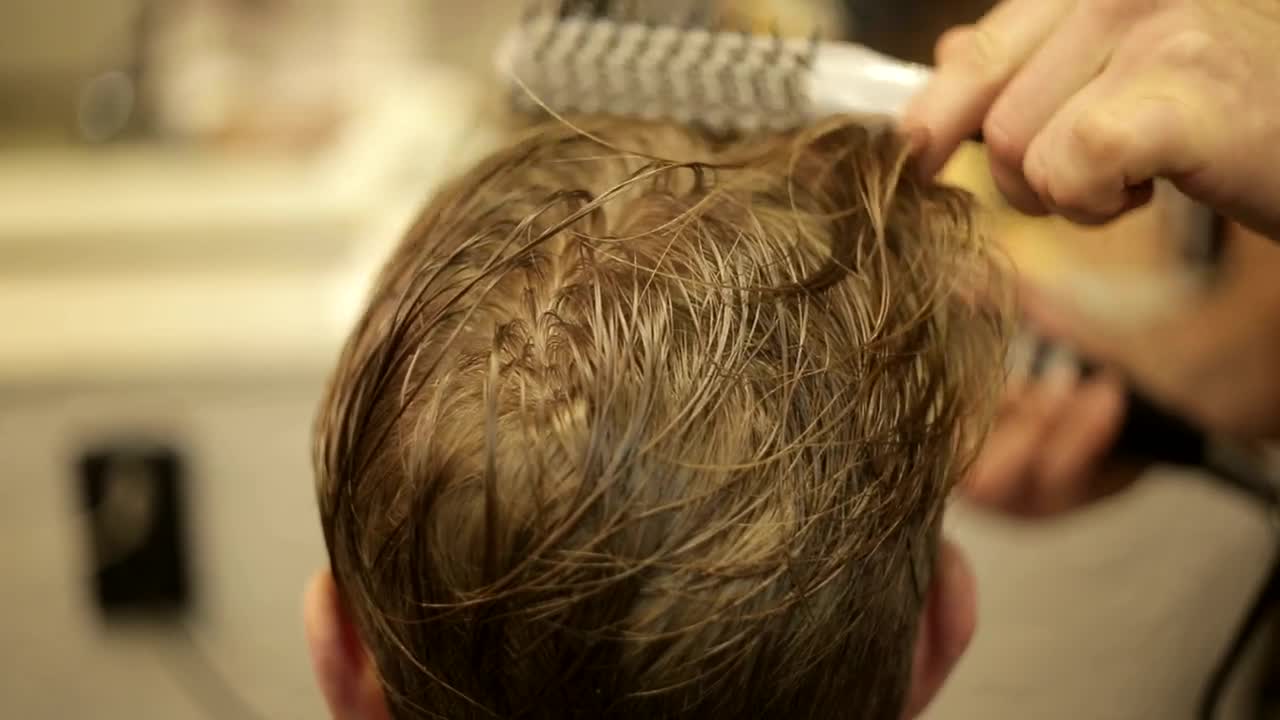 Stock Video Hairdresser Combing A Client Live Wallpaper For PC - Free Download