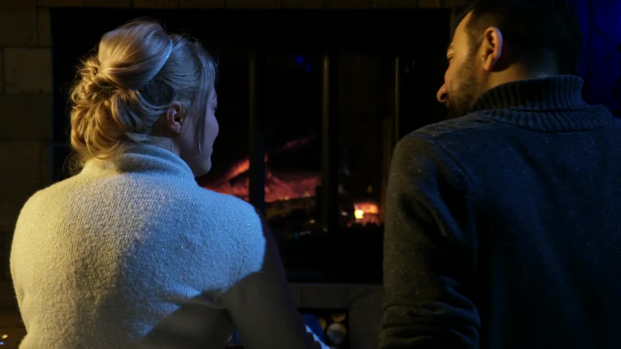 Stock Video Couple Sitting In Front Of The Fireplace Live Wallpaper For PC - Free Download