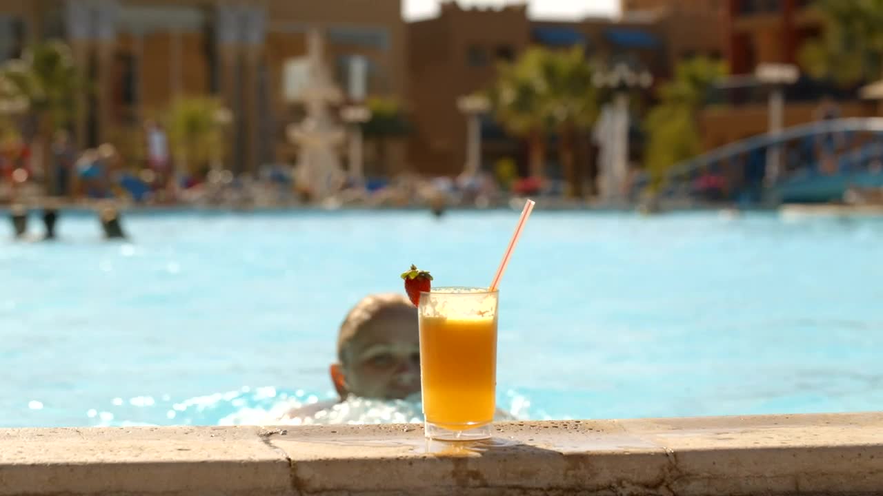 Stock Video Enjoying A Cocktail In The Pool Live Wallpaper For PC - Free Download
