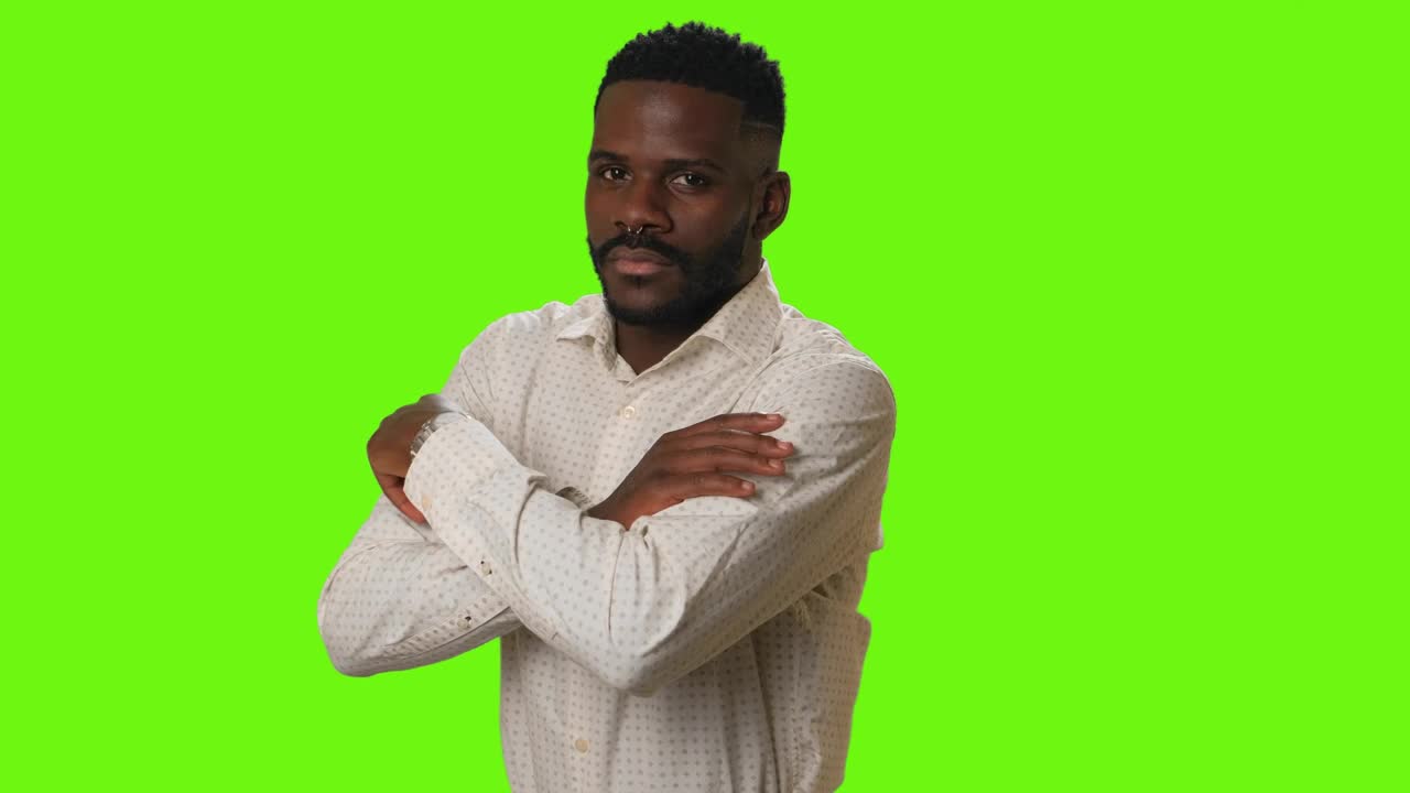 Stock Video Man Smiling With Arms Crossed On A Green Backgroun Animated Wallpaper - Free Download