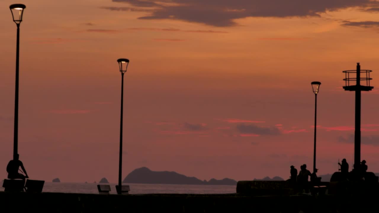 Stock Video Pedestrians On A Beach Pier In The Sunset Live Wallpaper - Free Download