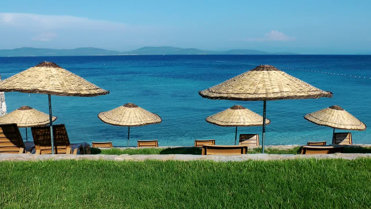 Stock Video Paradise Beach With Lounge Chairs And Umbrellas Live Wallpaper - Free Download
