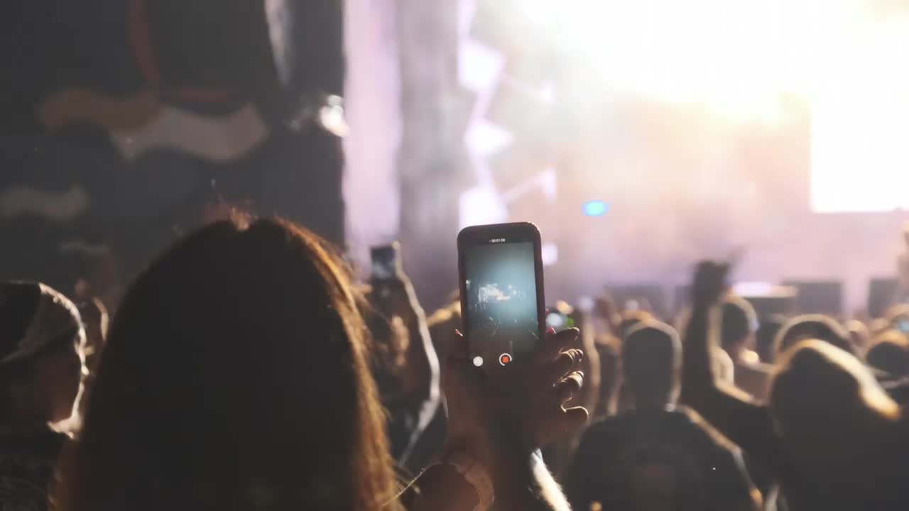 Free Stock Video Woman Recording A Concert With Her Smartphone Live Wallpaper - Free Download