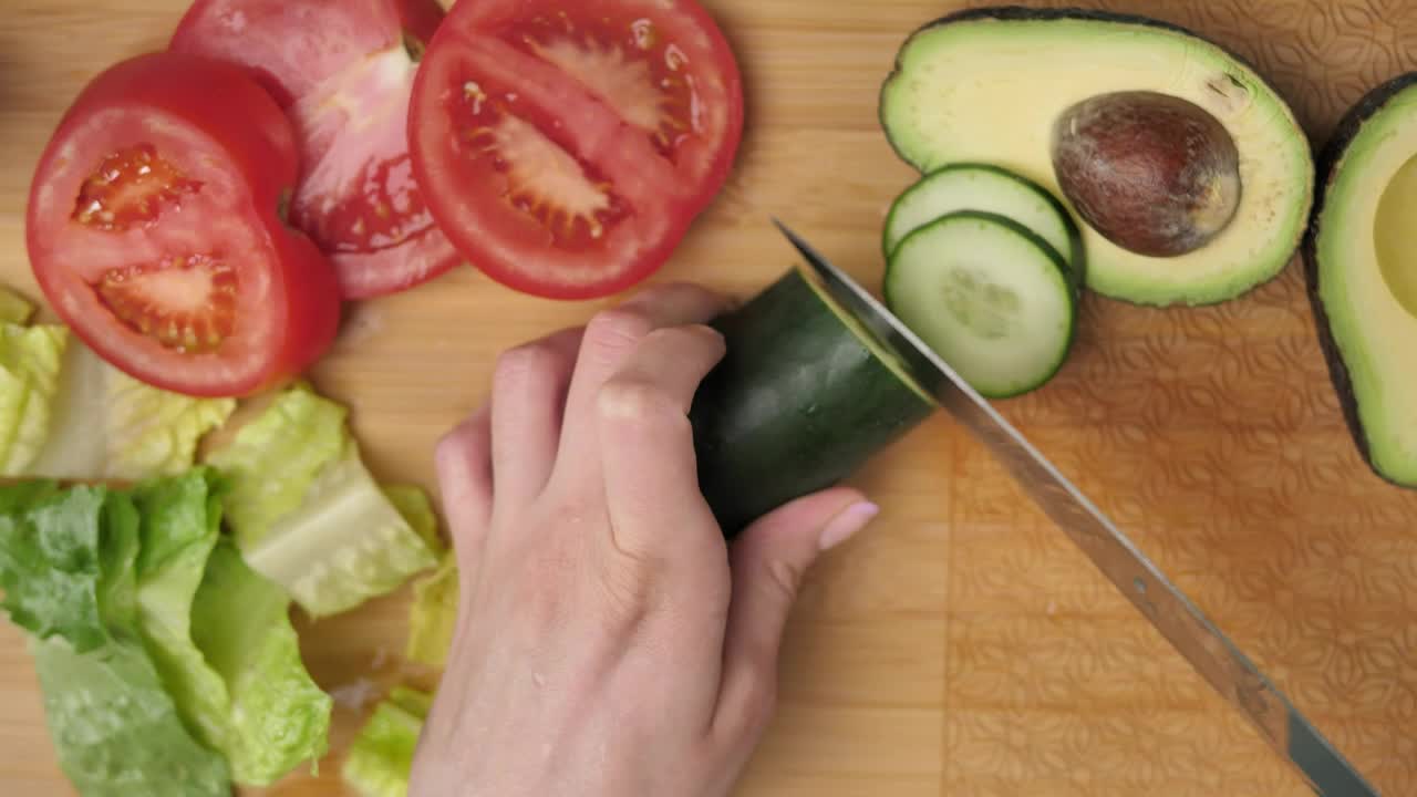 Free Video Stock top view of a woman slicing vegetables Live Wallpaper - Free Download