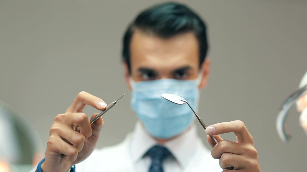 Stock Video Dentist Holding Tools Live Wallpaper For PC - Free Download