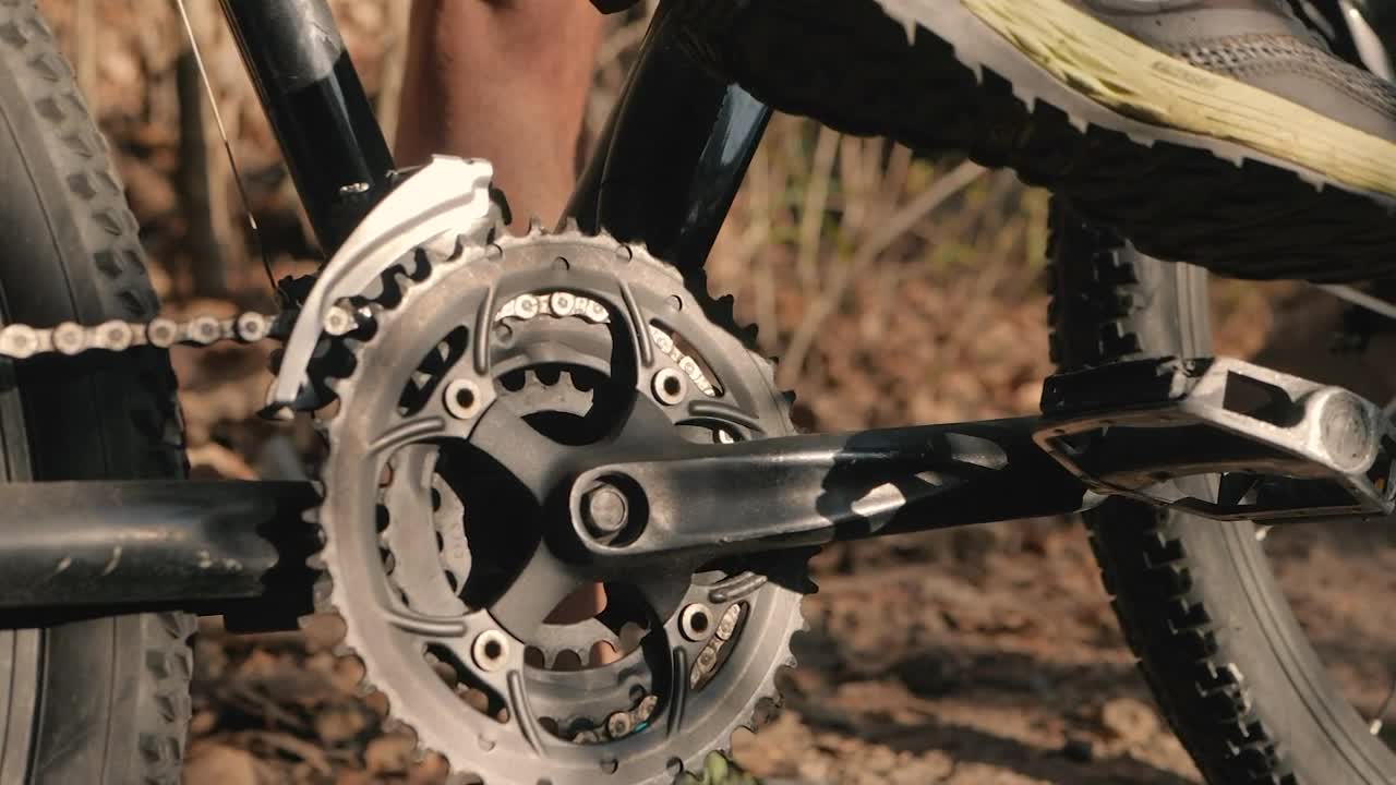 Stock Video Cyclist Places His Foot On The Pedal And Starts To Live Wallpaper For PC - Free Download