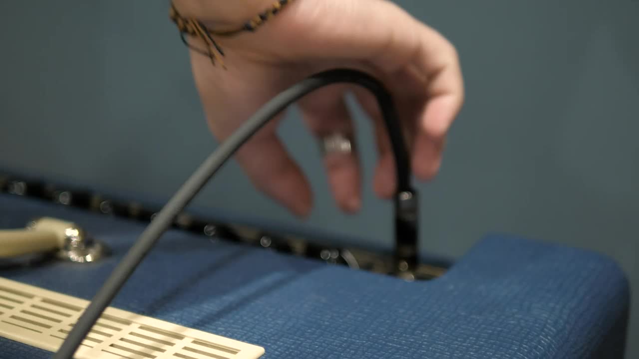 Stock Video Disconnecting An Instrument From An Amplifier Live Wallpaper For PC - Free Download