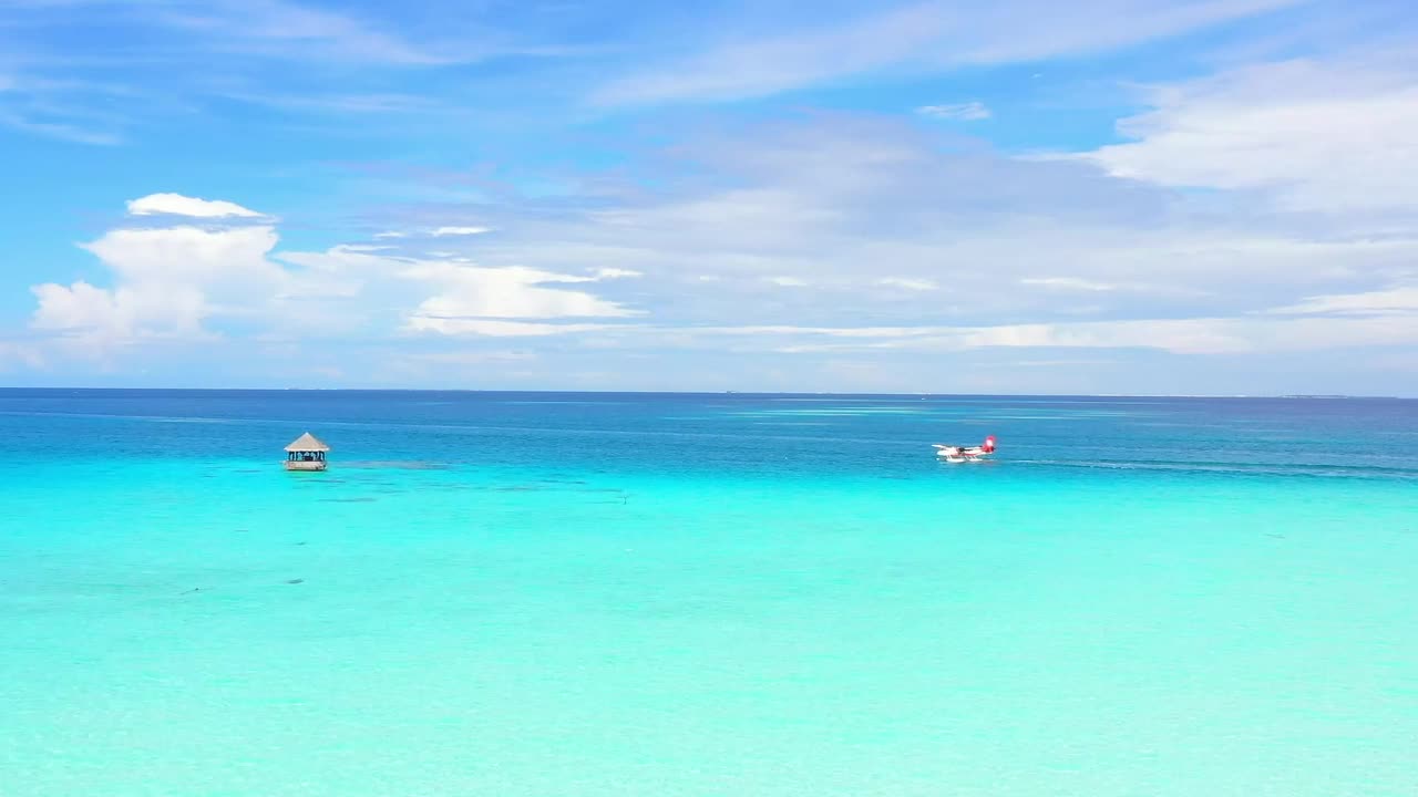 Stock Footage Water Plane Floating In The Turquoise Sea Live Wallpaper - Free Download