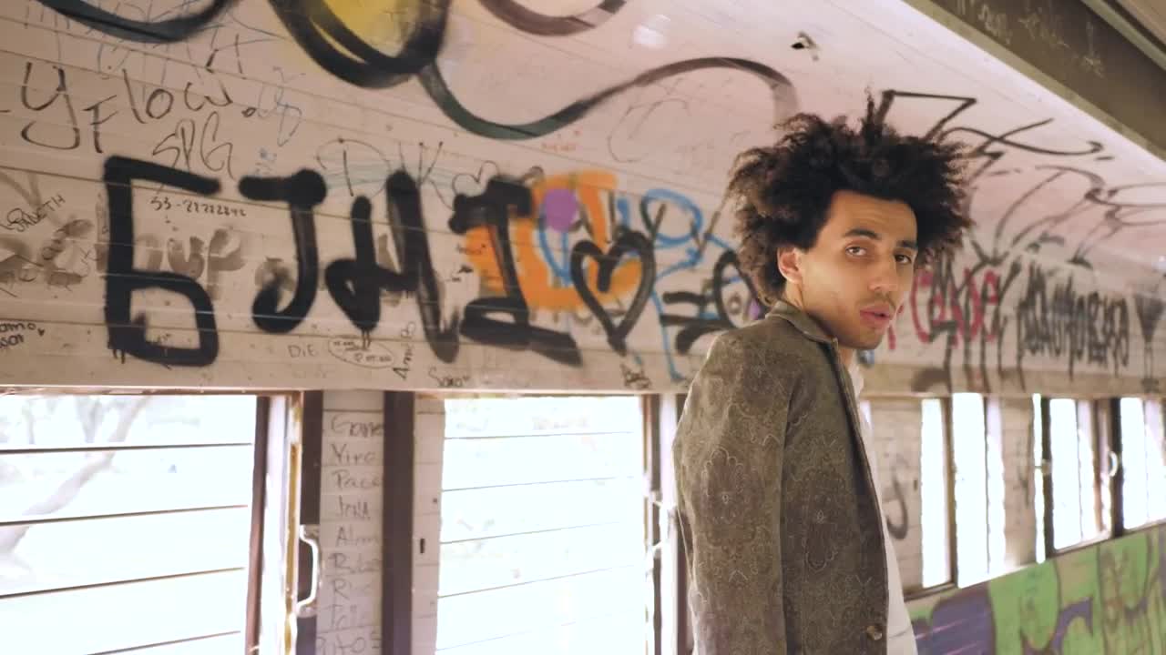 Stock Video Man Modeling In Graffitied Tunne Animated Wallpaper - Free Download