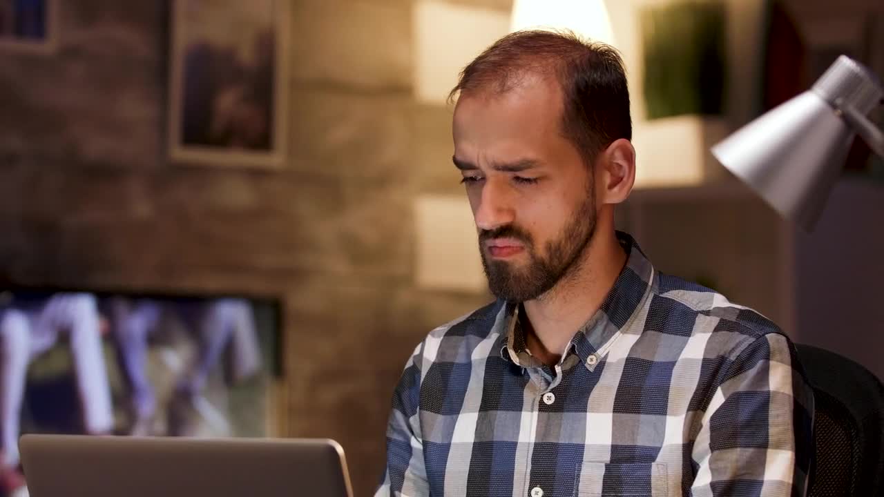 Stock Video Man Thinks Hard While Working On Laptop From Hom Animated Wallpaper - Free Download