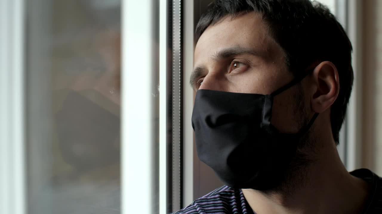 Stock Video Pensive Man In Quarantine Wearing Face Mask Live Wallpaper - Free Download