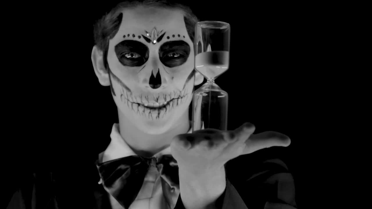 Stock Video Man Disguised As A Catrin With An Hourglass Animated Wallpaper - Free Download