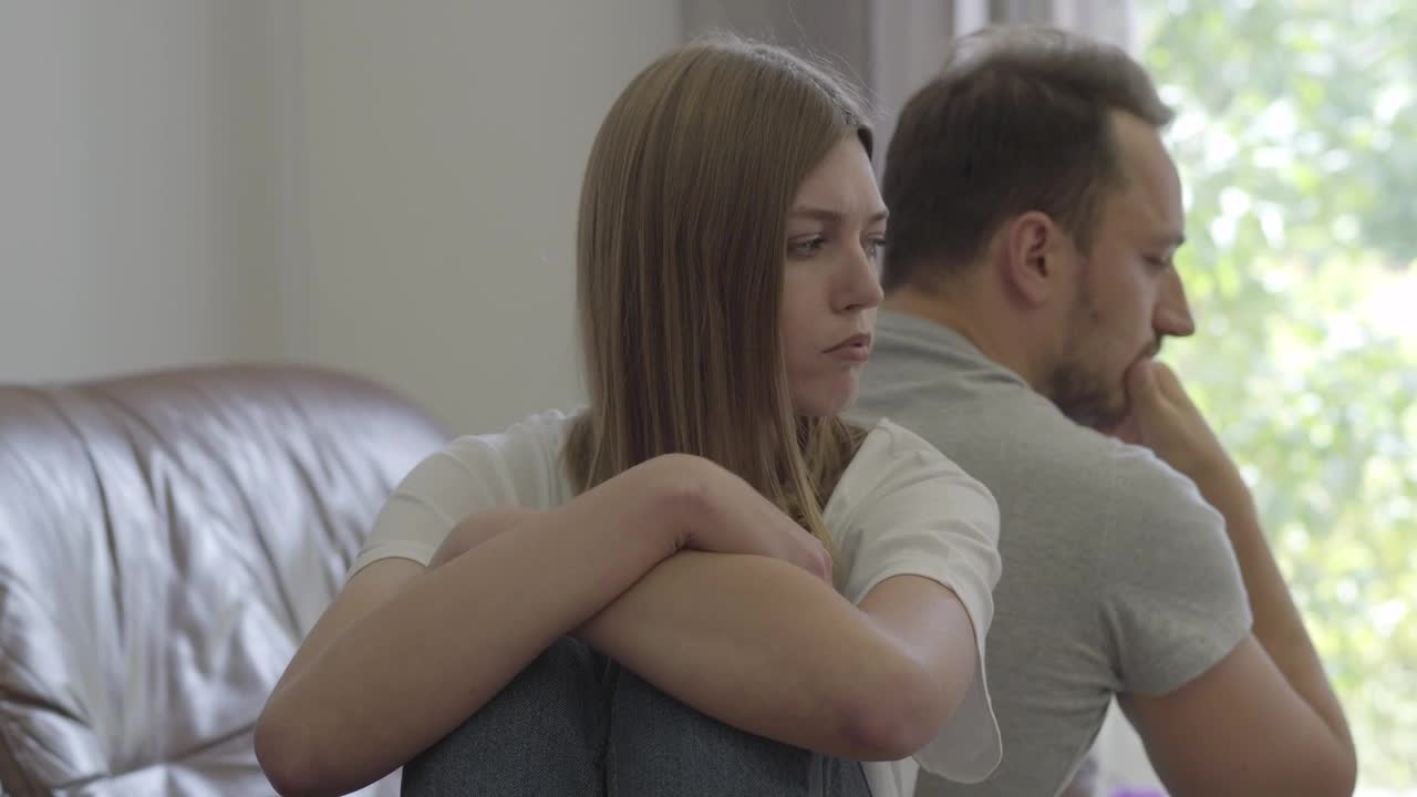Stock Video Couple Sitting Upset And Disappointed Live Wallpaper For PC - Free Download