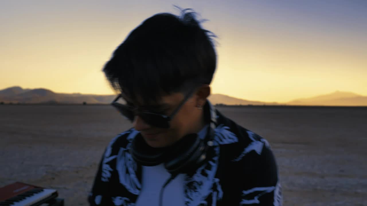 Stock Video Dj Mixing Electronic Music In A Lonely Desert Live Wallpaper For PC - Free Download