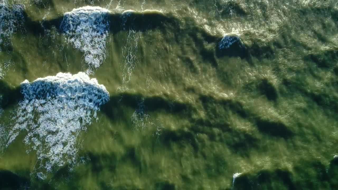 Stock Video Foamy Ocean Waves Crashing On A Sunny Beach Live Wallpaper For PC - Free Download