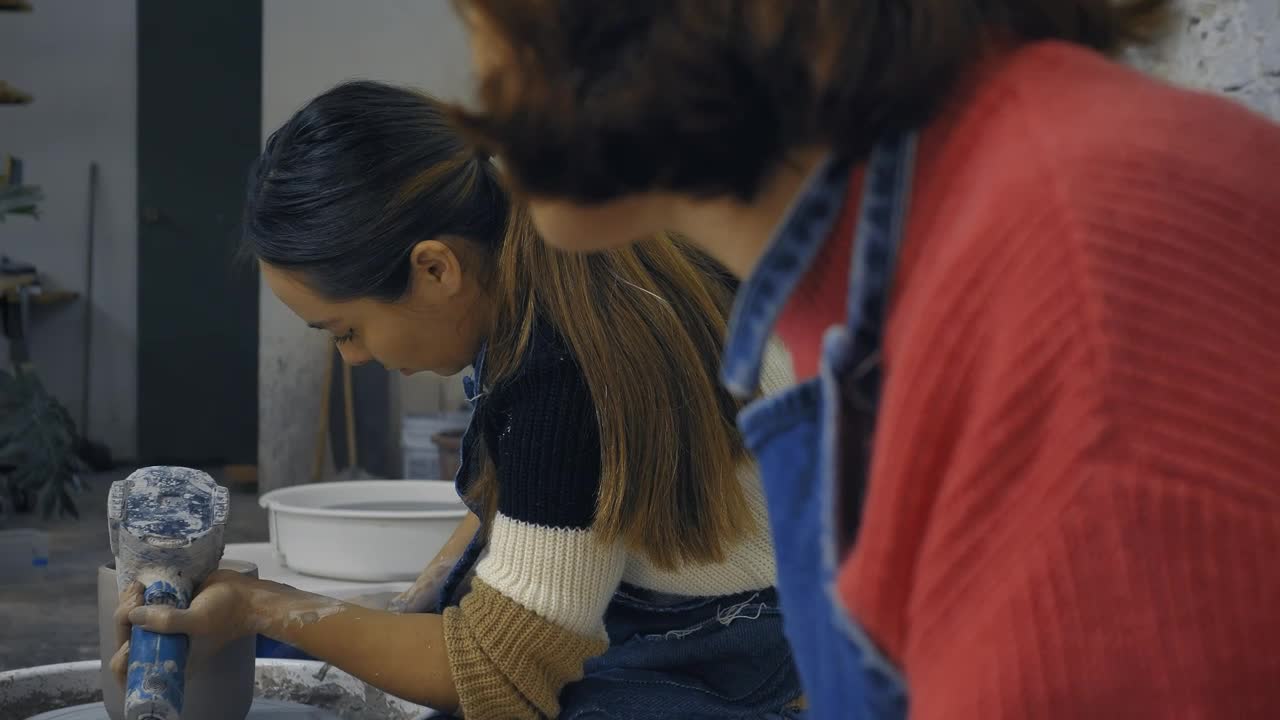 Free Stock Video Two Girls Working With Clay In A Pottery Workshop Live Wallpaper - Free Download