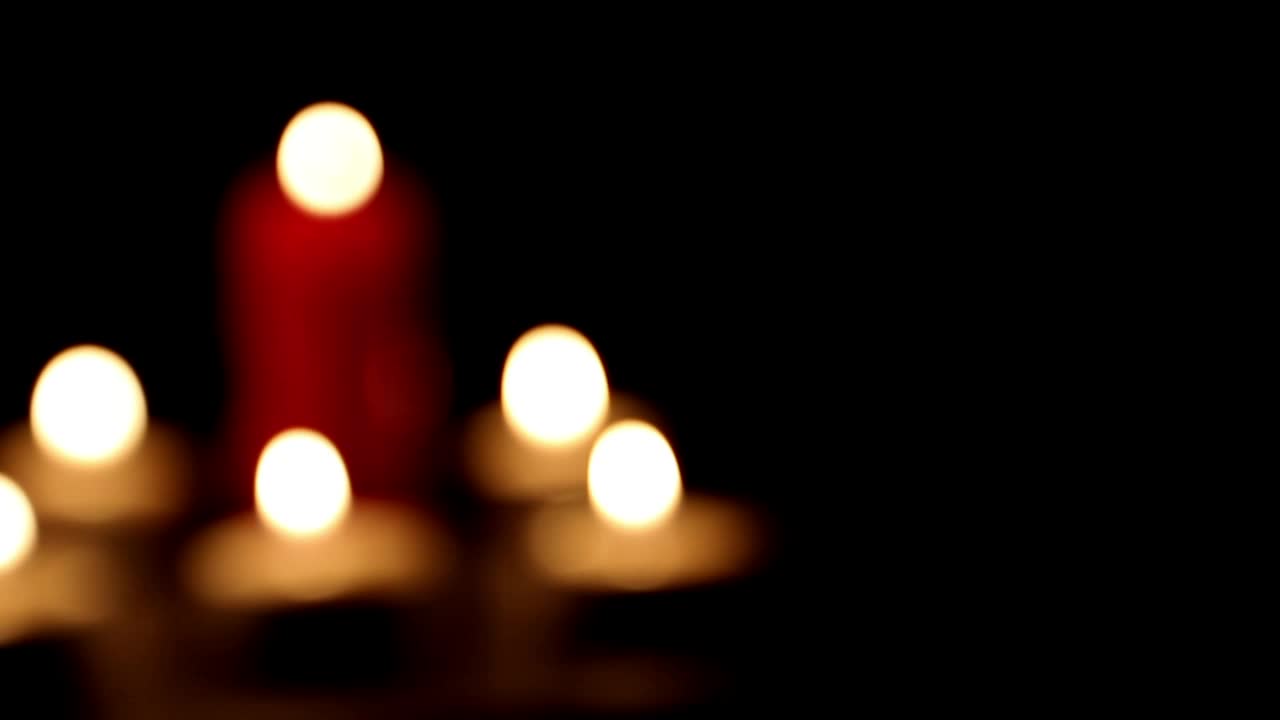 Video Stock Candles Burning In The Dark Out Of Focus Shot Live Wallpaper For PC - Free Download